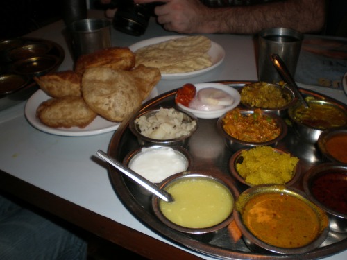 This is a typical lunch with different sauces you can eat with bread, roti, naan or rice. Super yummy, about 50 Rs (75c)